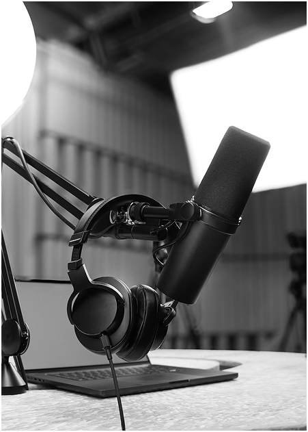 Two women recording a podcast