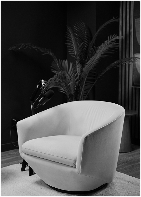 Podcast studio chair and microphone